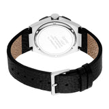 Back of a silver-toned angular watch with a black textured leather strap and silver-toned buckle.