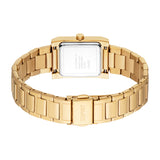 Gold-toned rectangular watch with a metal link bracelet. The silver-toned case back is visible with engraved text. The clasp