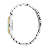 Silver-toned watch with gold-toned fluted bezel, light green dial with three clear stones, and silver-toned curved link brace