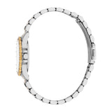 Silver-toned watch with gold-toned, crystal-studded bezel and crown, on a silver-toned metal link bracelet with a fold-over c