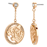 Pair of rose gold-toned dangle earrings with clear stone stud and circular tiger head pendant.