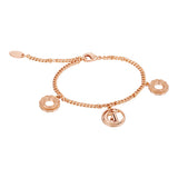 Rose gold-toned chain bracelet with a lobster clasp, extender chain, and three charms, including a 'J' initial and two patter