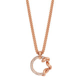Rose gold-toned curb chain necklace with a circular pendant, half encrusted with clear crystals and half wrapped by a texture