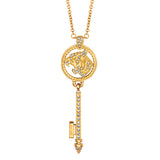 Gold-toned key pendant necklace with a circular top featuring a tiger motif embellished with clear stones, and a shaft also a