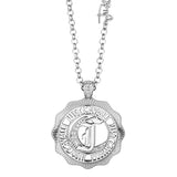 Silver-toned Just Cavalli fashion necklace with a round, scalloped pendant featuring a 'J' motif and clear stones.