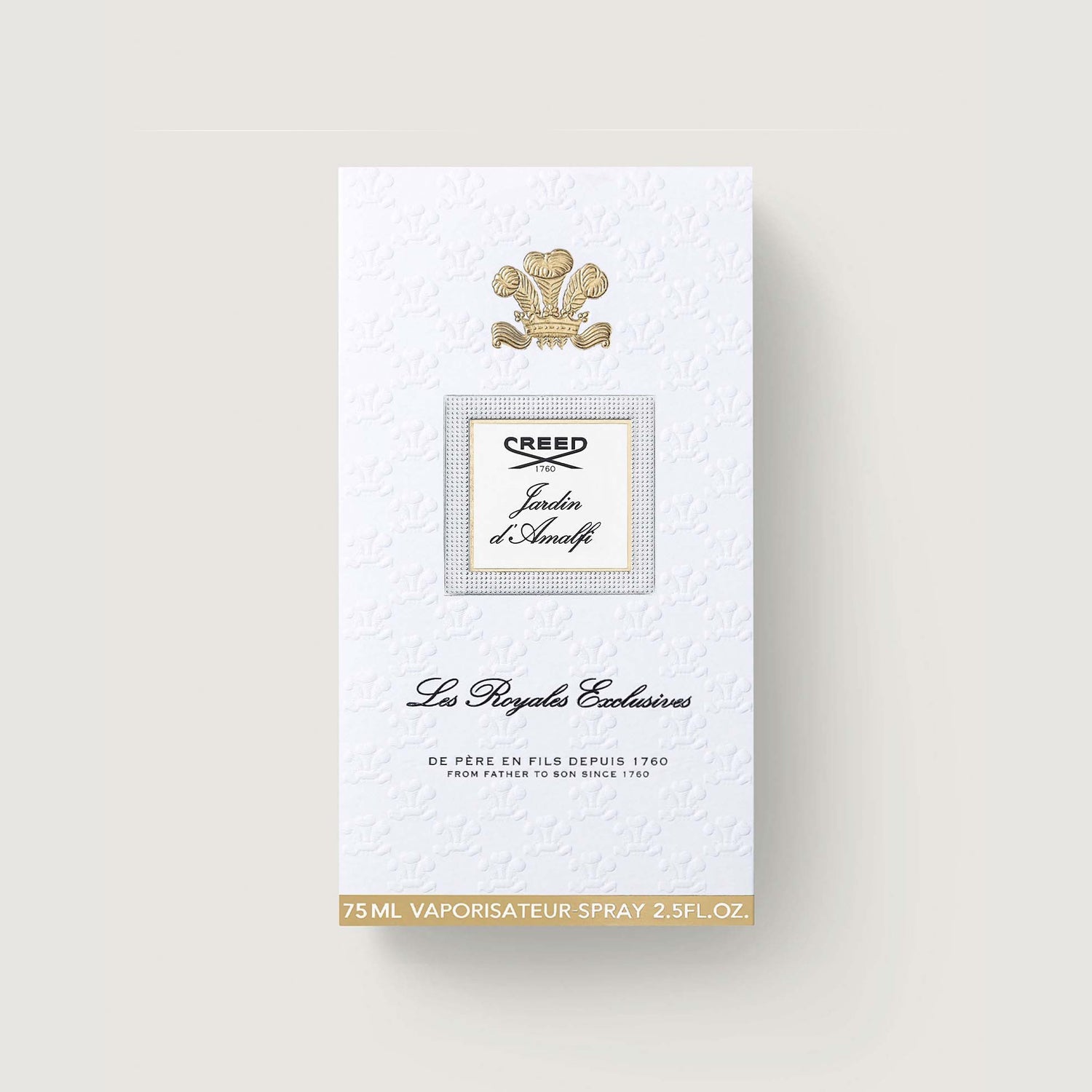 White perfume box with embossed pattern, gold-toned crown emblem, and silver-toned framed label 'Creed Jardin d'Amalfi'.