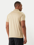 Sand short-sleeved polo shirt with a ribbed collar featuring a thin white stripe, made of smooth knit fabric.