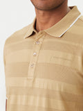 Camel polo shirt with horizontal textured stripes. Ribbed collar with white stripe, three-button placket, and 'KARL LAGERFELD