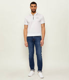 White polo shirt with a black zippered placket, black trim on the collar and short sleeves, and "KARL LAGERFELD" logo.