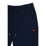 Navy jogging pants with an elasticated drawstring waist. Drawstrings have gold-toned aglets. Red embroidered logo on the righ