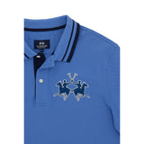 Blue pique knit polo shirt with a navy-striped collar, two-button placket, and an embroidered polo players logo on the chest.