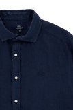 Navy blue linen long-sleeved shirt with a spread collar, button-down front, white buttons, and an embroidered logo on the lef