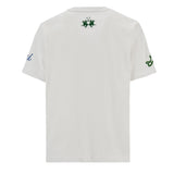 Optic white short-sleeved t-shirt with green embroidered polo logo on back, partial blue cursive on right sleeve, green cursi