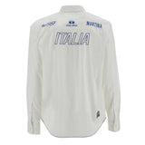 Optic white long-sleeved shirt with blue 'ITALIA' text, 'St. 1987', polo player logo, 'OFFICIAL SUPPLIER', and 'LA MARTINA' o