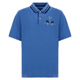 Medium blue pique knit polo shirt with a dark blue collar, light blue stripes, two white buttons, and an embroidered polo pla