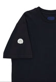 Black short-sleeved t-shirt with a ribbed crew neck and a circular silver-toned emblem featuring crossed swords on the left s
