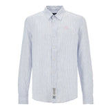 Light blue and white striped long-sleeved button-up shirt with a textured fabric, pink embroidered logo, and white buttons.