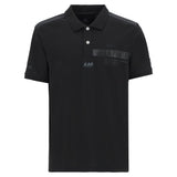 Black short-sleeved polo with collar, three white buttons, textured shoulder panels, and black La Martina & AAP logos on ches