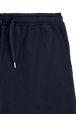 Dark blue shorts with an elasticated drawstring waist and silver-toned aglets. Features a visible side pocket.