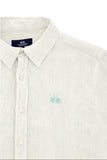 Off-white pinstriped linen collared shirt with light blue embroidered logo on the chest and light buttons.