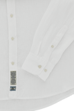 Optic white linen long-sleeve shirt with a button-down front, buttoned cuffs, and a fabric label on the placket.