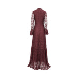Rear view of Andrea & Leo Couture gown showing the sheer embellished back, zipper closure, and elegant satin train.