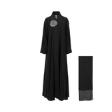 Front view of the Nero 52 Black Abaya with vertical white contrast panels and matching scarf.