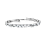 Silver-toned dual-band open cuff bracelet with one band set with clear round stones and the other with a textured pattern.
