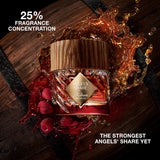 Clear faceted glass perfume bottle with amber liquid, a gold-toned diamond label, and a light brown wood-grained cap.