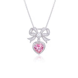 Front view of the Princess necklace showing the silver bow and pink heart crystal.