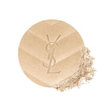 Circular champagne shimmery pressed powder with an embossed YSL logo and chevron pattern. Crumbled powder on the right side.