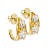 Radiate warmth and brilliance with the Lara Heems Solstice Gold Hoop Earrings.