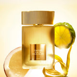 Frosted rectangular perfume bottle with vertical ridges, a gold-toned label, and a ridged gold-toned cap.