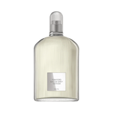 Clear glass Tom Ford Signature Eau de Grey Vetiver EDT spray bottle with vertical fluting, silver-toned neck, and ribbed cap,