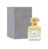 Touch of Oud Aghla 80ml perfume bottle standing next to its premium grey debossed gift box on Blue Salon Online. The luxury bottle showcases its warm golden fragrance fluid against the structured presentation case.