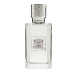 Clear rectangular glass perfume bottle with a light liquid and a silver-toned textured cap, featuring a white and grey label.