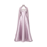 Front view of ice move  halter neck satin evening gown with embellished collar and sheer floor-length cape overlay.