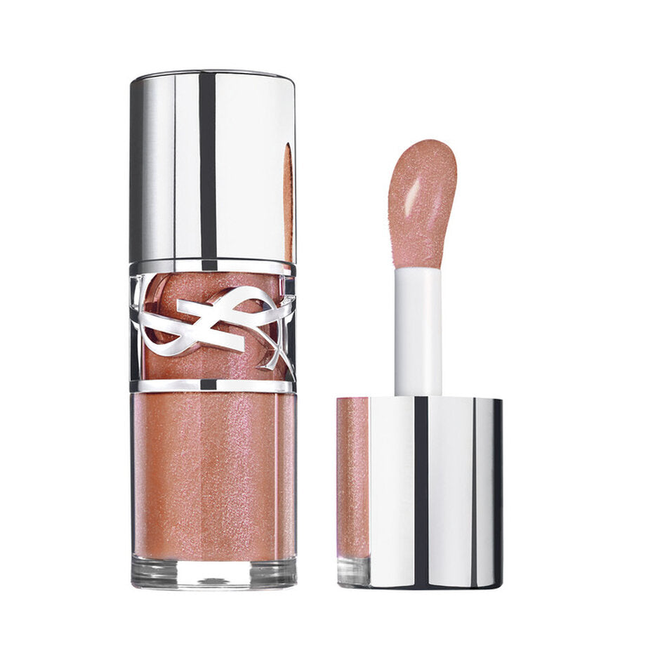 Open tube of YSL Loveshine Gloss in a shimmering peachy-pink shade, with a silver-toned cap and applicator wand.