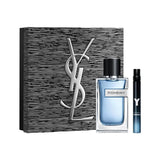 Yves Saint Laurent Y Eau de Parfum set: clear rectangular bottle, light blue liquid, dark blue travel spray, striped box, sil