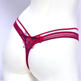 ليز شارميل سروال سترينغ لون بنفسجي فوشيا مقاس S