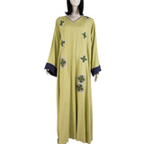 نيرو عباية اللون أخضر فاتح