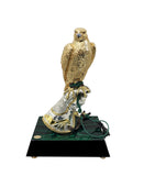 Goldline Golden Falcon With Closed Wings On Silver Glove
