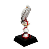 Goldline Small Falcon On Stand With Wood Base