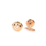 أزرار كورلوف مودي سو بريتيش من الستيل بلون ذهبي وردي، مع شعار ابيض