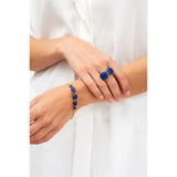 خاتم "ليه نيريدس" ، "أنت وأنا" ، بحجر أزرق داكن مع رقائق ذهبية ، مقاس ٥٦