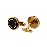 ازرار سمالتو لون ذهبي وردي مع واجهة ذات وسط اسود محاط بدائرة من الكريستال